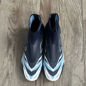 Lotto blue and white soccer shoes